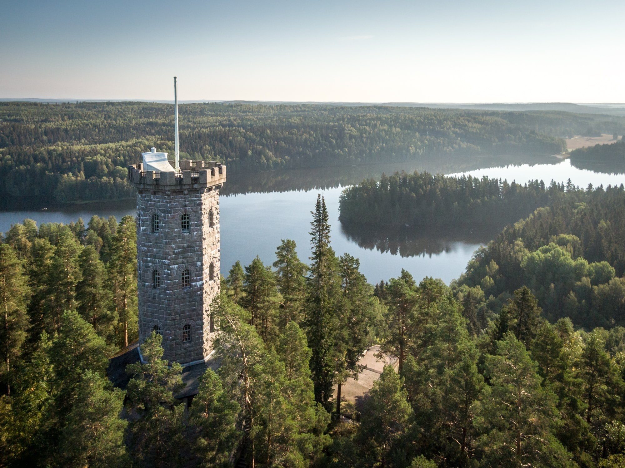 Aulanko observation tower and lake Aulangonjärvi in the middle of Aulanko Nature Reserves Forest.