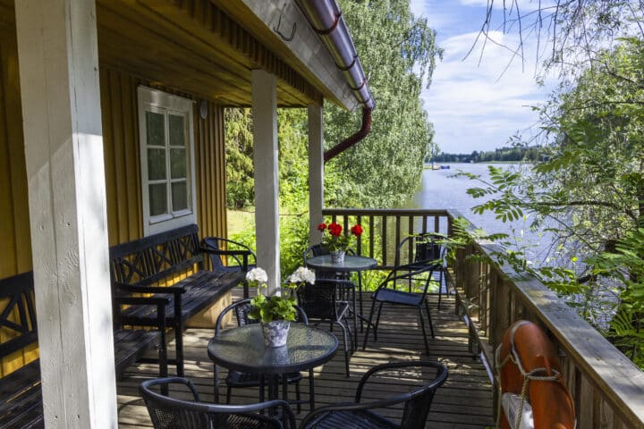 A terrace on top of a lake.